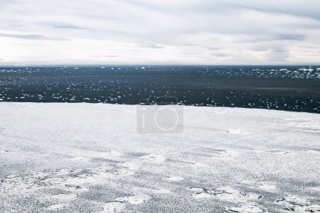 Photo for Aerial view of the myriads of icebergs of different sizes and shapes broken off the Antarctic Ice Shelf, Vega Island, Antarctica - Royalty Free Image