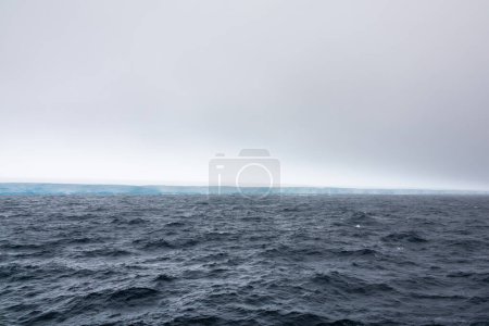 Photo for Iceberg A23a, with an area of 4,000 square kilometers, the largest iceberg in the world, is drifting off Antarctica - Royalty Free Image