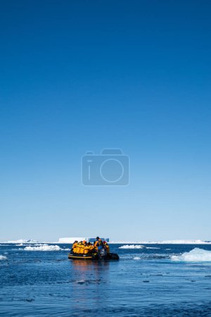 Photo for Snow Hill island, Antarctica - December 11, 2023 - Quark Expeditions tourists explore the icebergs in the Weddell Sea, Antarctica - Royalty Free Image
