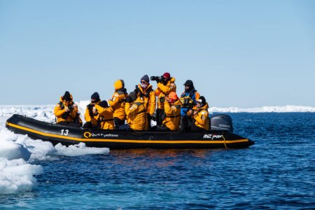 Photo for Snow Hill island, Antarctica - December 11, 2023 - Quark Expeditions tourists explore the Weddell Sea around the Snow Hill island in the zodiac inflatable boat, Antarctica - Royalty Free Image