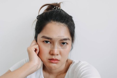 Photo for Asian Thai woman take selfie with bored face, unhappy boring time isolated over white background wall. - Royalty Free Image