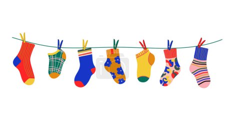Illustration for Socks on rope. Cotton or wool sock dry and hang on laundry string with clothespins. Children socks with textures and patterns vector cartoon. Illustration wool and cotton socks in rope - Royalty Free Image