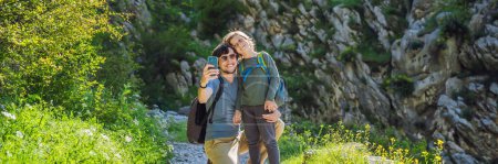 Photo for Family travel - father and son hiking in mountains of Montenegro, Kotor. BANNER, LONG FORMAT - Royalty Free Image