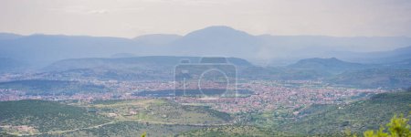Photo for Panoramic landscape Podgorica, Montenegro. View from the top of the mountain. Panoramic Landscape Of Mountain city. BANNER, LONG FORMAT - Royalty Free Image