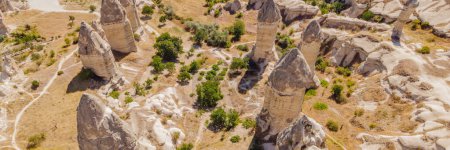 Unique geological formations in Love Valley in Cappadocia, popular travel destination in Turkey. BANNER, LONG FORMAT