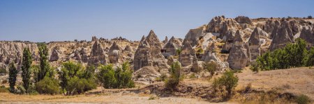 Unique geological formations in Love Valley in Cappadocia, popular travel destination in Turkey. BANNER, LONG FORMAT