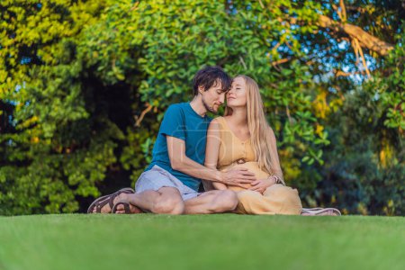Pregnant woman and her husband spend quality time together outdoors, savoring each others company and enjoying the serenity of nature.