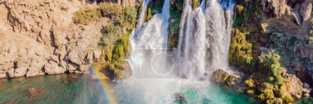 BANNER, LONG FORMAT Lower Duden Falls drop off a rocky cliff falling from about 40 m into the Mediterranean Sea in amazing water clouds. Tourism and travel destination photo in Antalya, Turkey