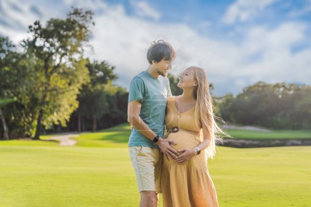 A blissful moment as a pregnant woman and her husband spend quality time together outdoors, savoring each others company and enjoying the serenity of nature.