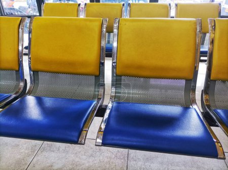 Photo for Long iron chairs for queuing - Royalty Free Image