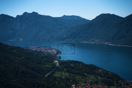                      Lake Como with charming yachts surrounded by hills 