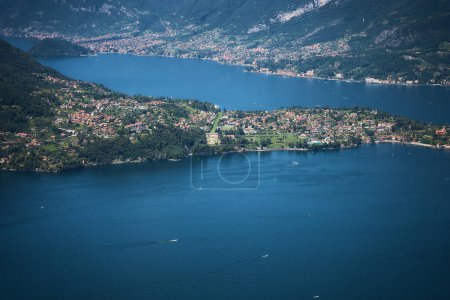           Lake Como with charming yachts surrounded by hills            