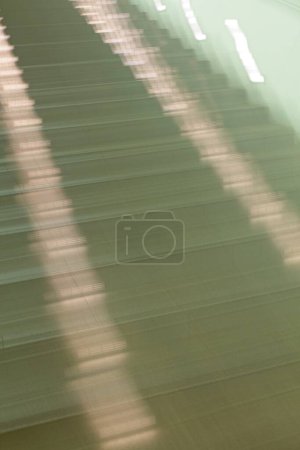 Photo for ICM abstract of stairs inside with lights. - Royalty Free Image