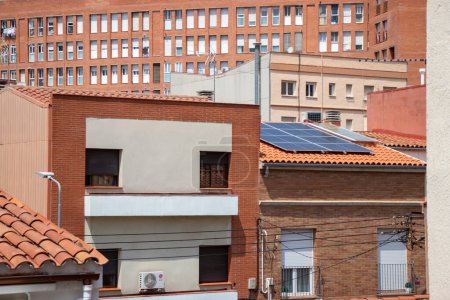 Photo for Solar Panels installed on a rooftop of a residential building in Sabadell, Spain - Royalty Free Image