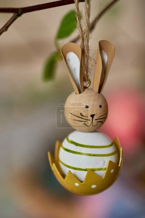 Photo for Easter rabbit decoration hanging on branch. High quality photo - Royalty Free Image