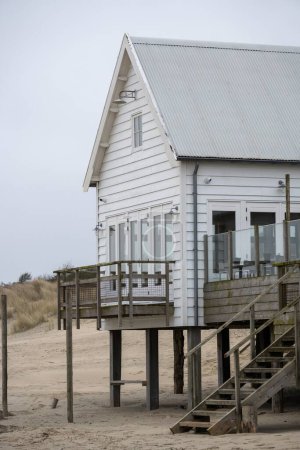 Beach house on stilts by the sea