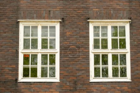 Photo for Old brick building with old double windows - Royalty Free Image