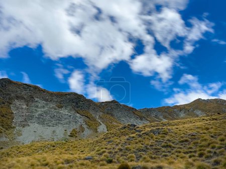 Photo for Beautiful mountain landscape in the background of clouds and mountains, Roy's Peak Track, Wanaka, New Zealand - Royalty Free Image