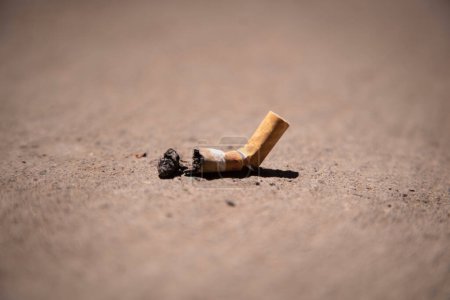 Photo for Cigarette butts isolated in the floor - Royalty Free Image