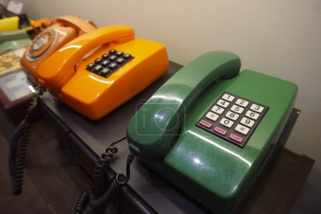 set of two vintage analog phone with pop-up color