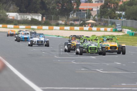Photo for 11-20-2022 PORTUGAL, LISBON: Caterham festival - colorful racing karts driving on the track. Mid shot - Royalty Free Image