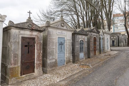 Photo for February 22, 2023 Lisbon, Portugal: Alto de Sao Joao Cemetery - family crypts. Mid shot - Royalty Free Image
