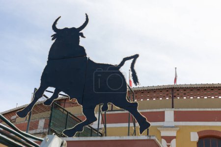 Photo for March 26, 2023 Lisbon, Portugal: Tourada - sign of a black bull at the entrance to the arena. Mid shot - Royalty Free Image