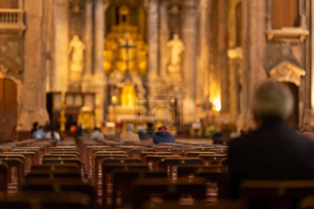Photo for People sit on chairs in the church and listen to the sermon. Mid shot - Royalty Free Image
