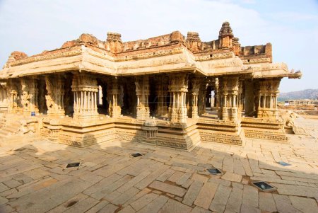 Photo for Sixteenth century Vithala temple monument of Hampi fames for musical pillars , Karnataka , India World Heritage - Royalty Free Image