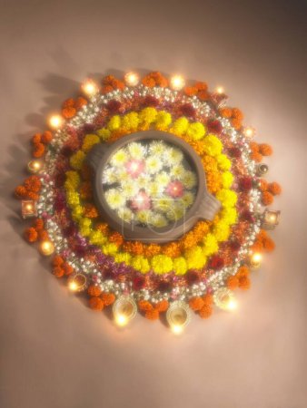 Photo for Diyas and flowers arrangement for Diwali festival of lights - Royalty Free Image