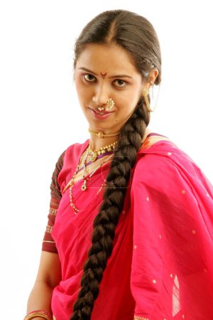 South Asian Indian Maharashtrian girl wearing traditional navwari nine yard sari 