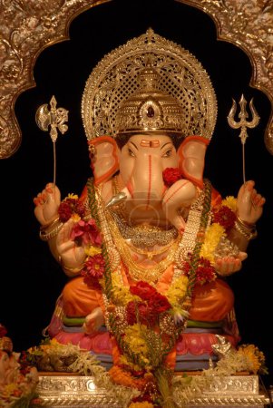 Photo for Idol of Lord Ganesh elephant Headed worshiping for Ganapati Festival at Tambadi Jogeshwari , Second in Honour at Pune , Maharashtra , India , Asia - Royalty Free Image