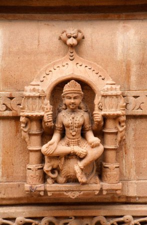 Goddess sitting on elephant on the wall of panchasara parasvanath jain temple , Patan , Gujarat , India