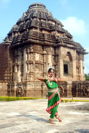 Photo for Dancer performing classical traditional odissi dance at Konarak Sun temple, Konarak, Orissa - Royalty Free Image