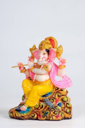 Photo for Statue of lord ganesh playing flute , India - Royalty Free Image