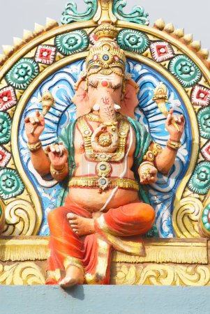 Photo for Colourfully painted stucco statue of lord Ganesh ganpati on temple , Thanjavur , Tamil Nadu , India - Royalty Free Image