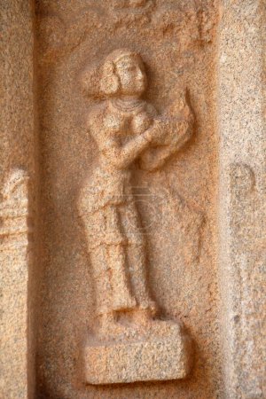 Photo for Statue carved in Ramchandra temple , Hazara rama , Hampi , Vijayanagar , UNESCO World Heritage , Deccan plateau , Taluka Hospet , District Bellary , Karnataka , India - Royalty Free Image