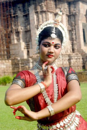 Photo for Dancer performing classical traditional odissi dance at Konarak Sun temple, Konarak, Orissa, India - Royalty Free Image