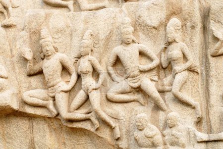Arjunas Penance or Bhagirathas Penance massive open air bas_relief monolith in 7th century located in Mahabalipuram Tamil Nadu , India