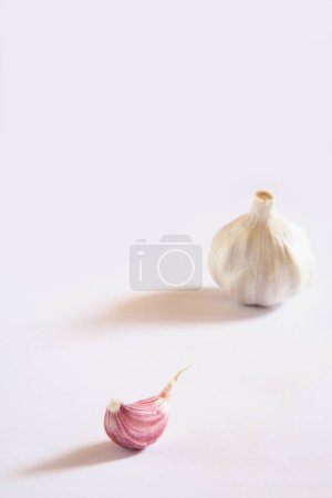 Photo for Indian spice , Garlic bulbs and cloves Lahsun Allium sativum on white background - Royalty Free Image