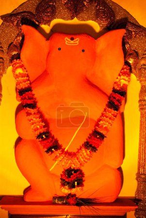 Replica of idol of Shree Varadvinayak of Mahad one of Ashtavinayaka lord ganesh elephant headed god for Ganpati festival at Pune , Maharashtra , India