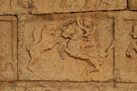Photo for Statue on wall of Mahanavami Dasara Dhibba , Hampi Vijayanagar ruins , Karnataka , India - Royalty Free Image