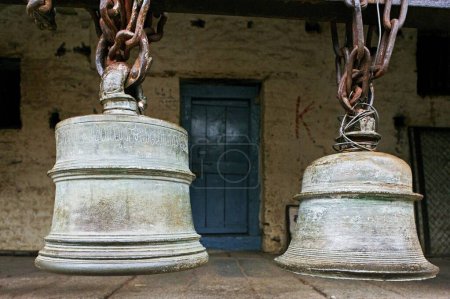 Photo for Bells in Virupaksha or Pampapati temple 13th_17th century , Hampi , Vijayanagar , Dist Bellary , Karnataka , India UNESCO World Heritage - Royalty Free Image