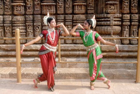 Photo for Dancers performing classical traditional odissi dance at Konarak Sun temple, Konarak, Orissa, India - Royalty Free Image