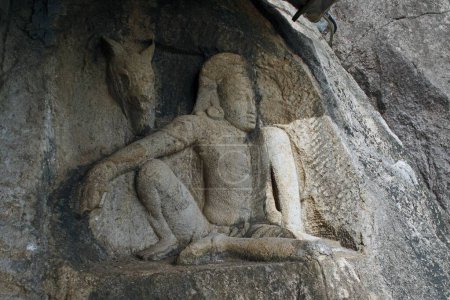 Foto de Estatua arruinada en el sitio del patrimonio mundial, ciudad sagrada de Anuradhapura, Isurumuniya Vihare, Sri Lanka - Imagen libre de derechos