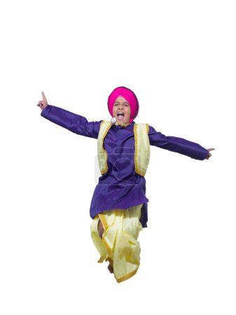 Foto de Sikh chico realizando danza folclórica bhangra - Imagen libre de derechos