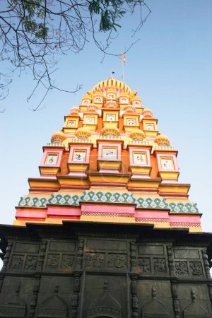 Photo for Sculptured colourful dome of temple dedicated to lord Shiva , Wagholi , Pune , Maharashtra , India - Royalty Free Image