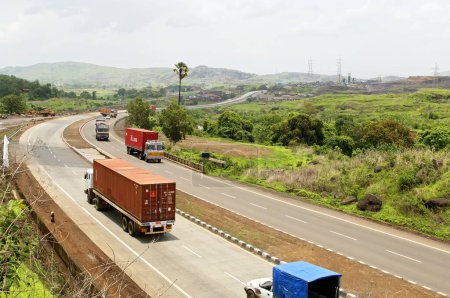 Photo for Trucks on roadway panvel to pune, Maharashtra, India - Royalty Free Image
