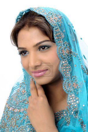Portrait of Indian lady in designer blue sari 