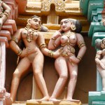 Nude women or gopika teasing each other carved on Ranga gopuram gateway of gigantic Sri Ranganathswami temple , Srirangam , Tiruchirapalli Trichy , Tamil Nadu , India